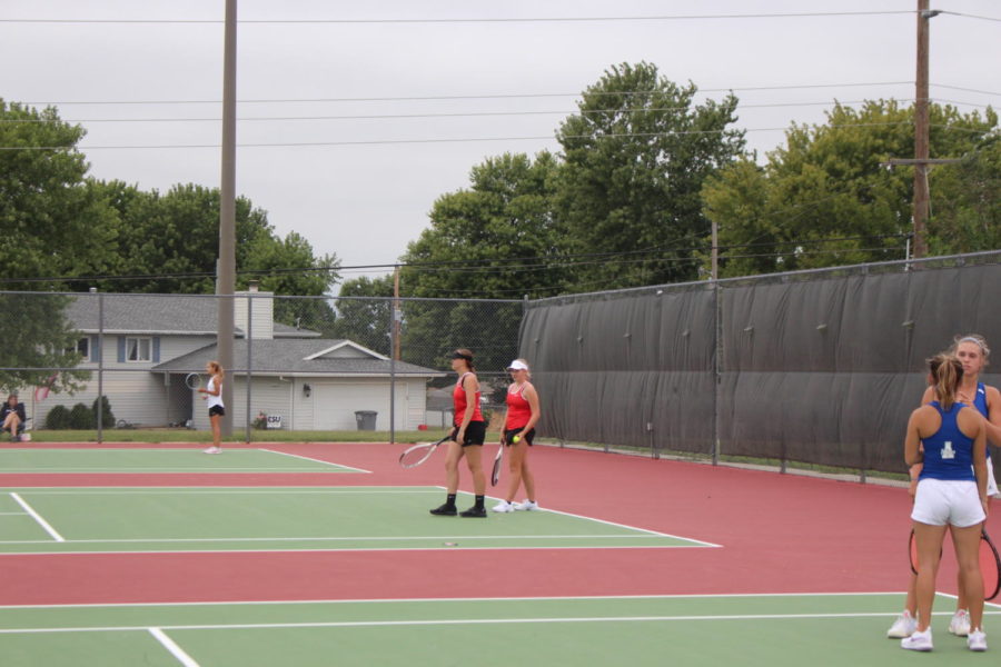 Lillee Frank (12) and Payton Chanley (9) play their first match together. Photo by Keira Flack..