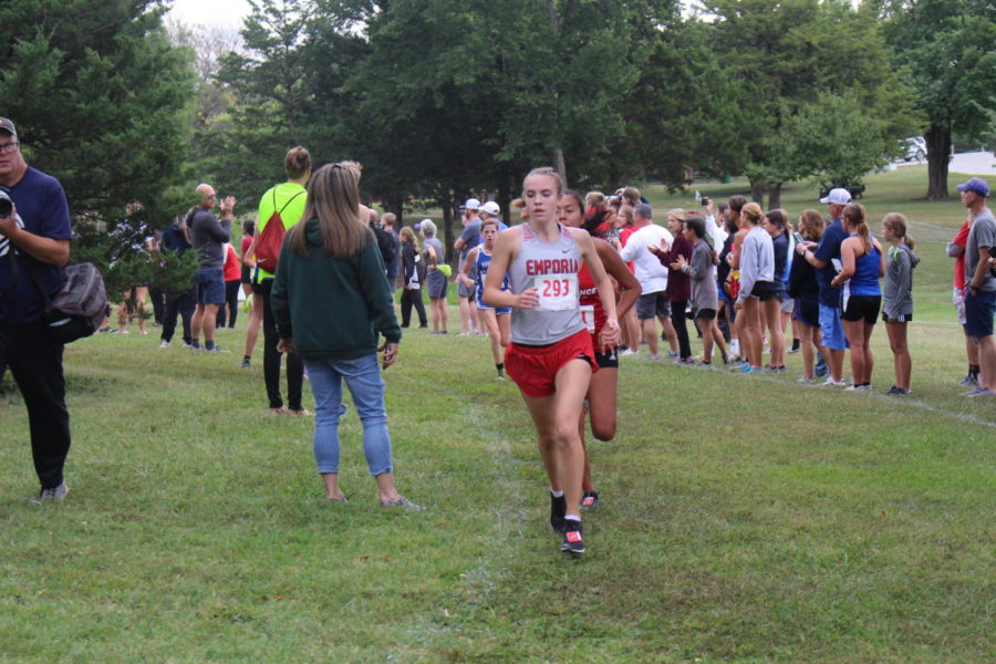 Micah Sheffy-Harris (11) turns corner while running at the home meet hosted on September 11th. photo by reagan thompson.