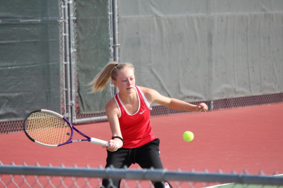 Kali Keough (9) prepares to hit ball back to opponent in her second match. Photo by Avary Eckert.